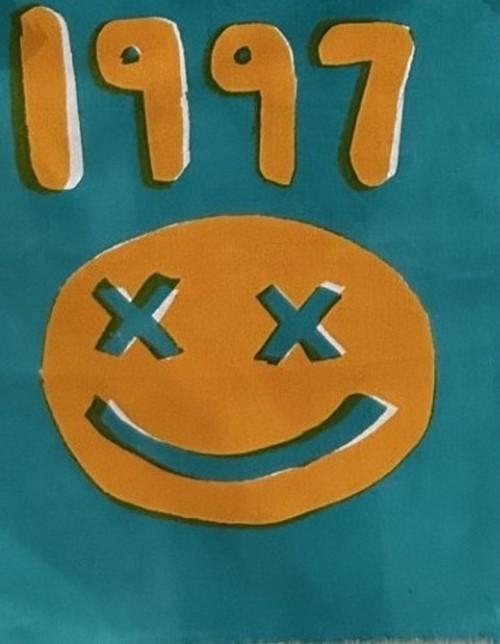 Orange smiley face with cross eyes and the year 1997 on a teal background
