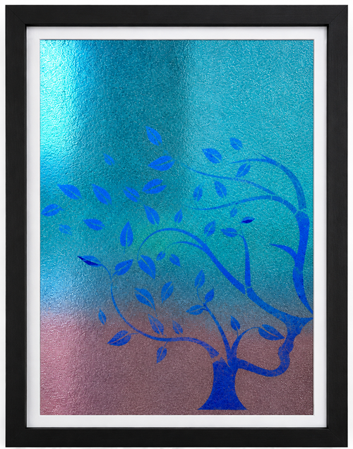 Framed print of a blue windswept tree on a shimmering teal and pink background
