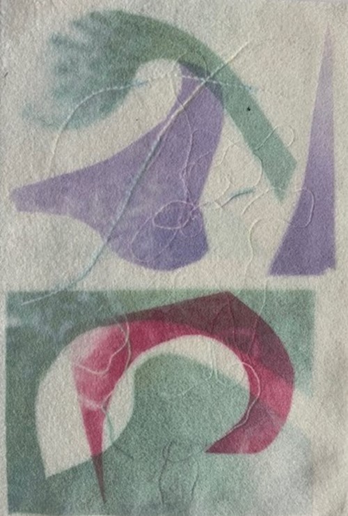 Soft abstract print of green, purple and pink shapes on textured paper