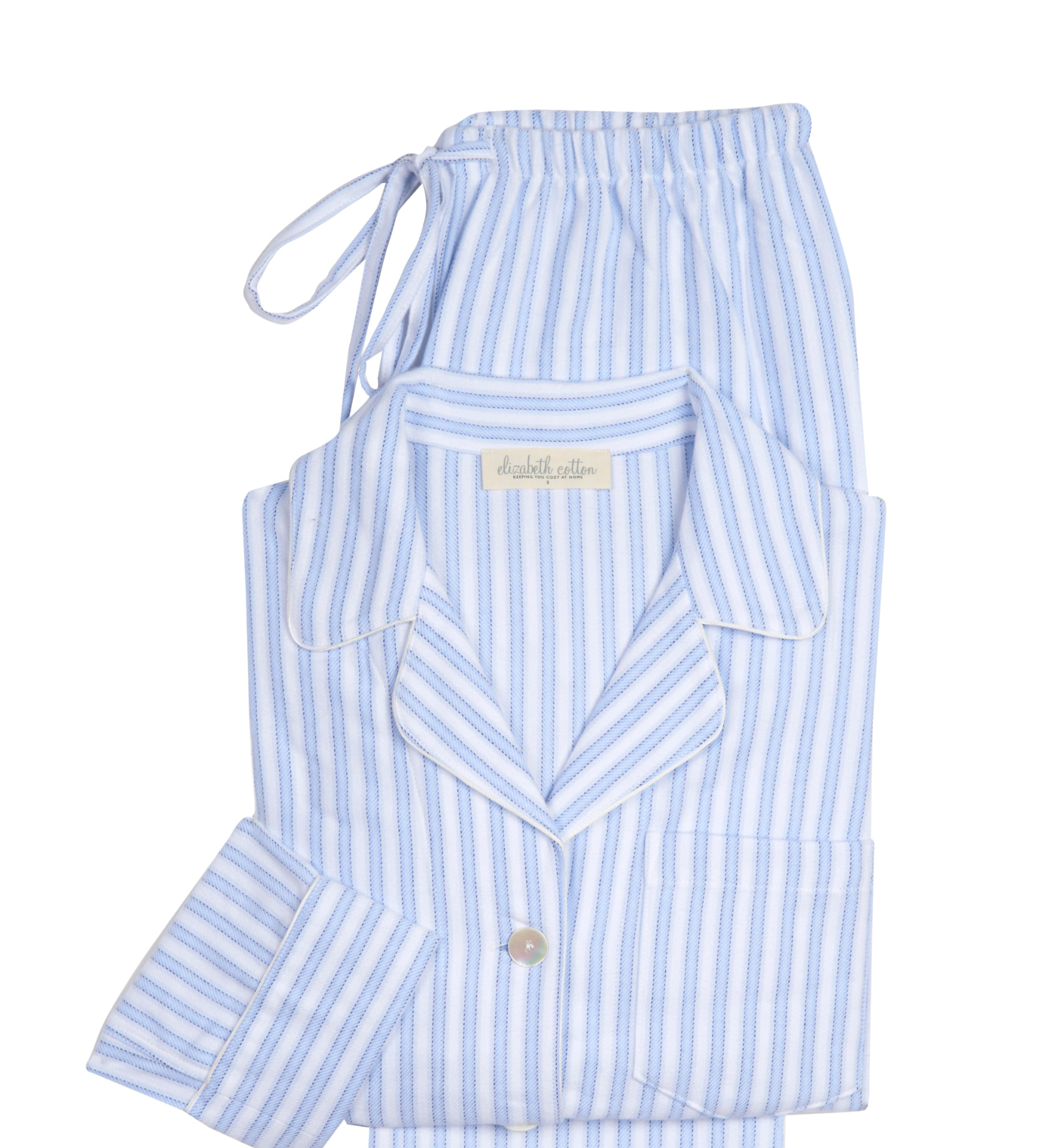 Folded blue and white striped cotton pyjamas